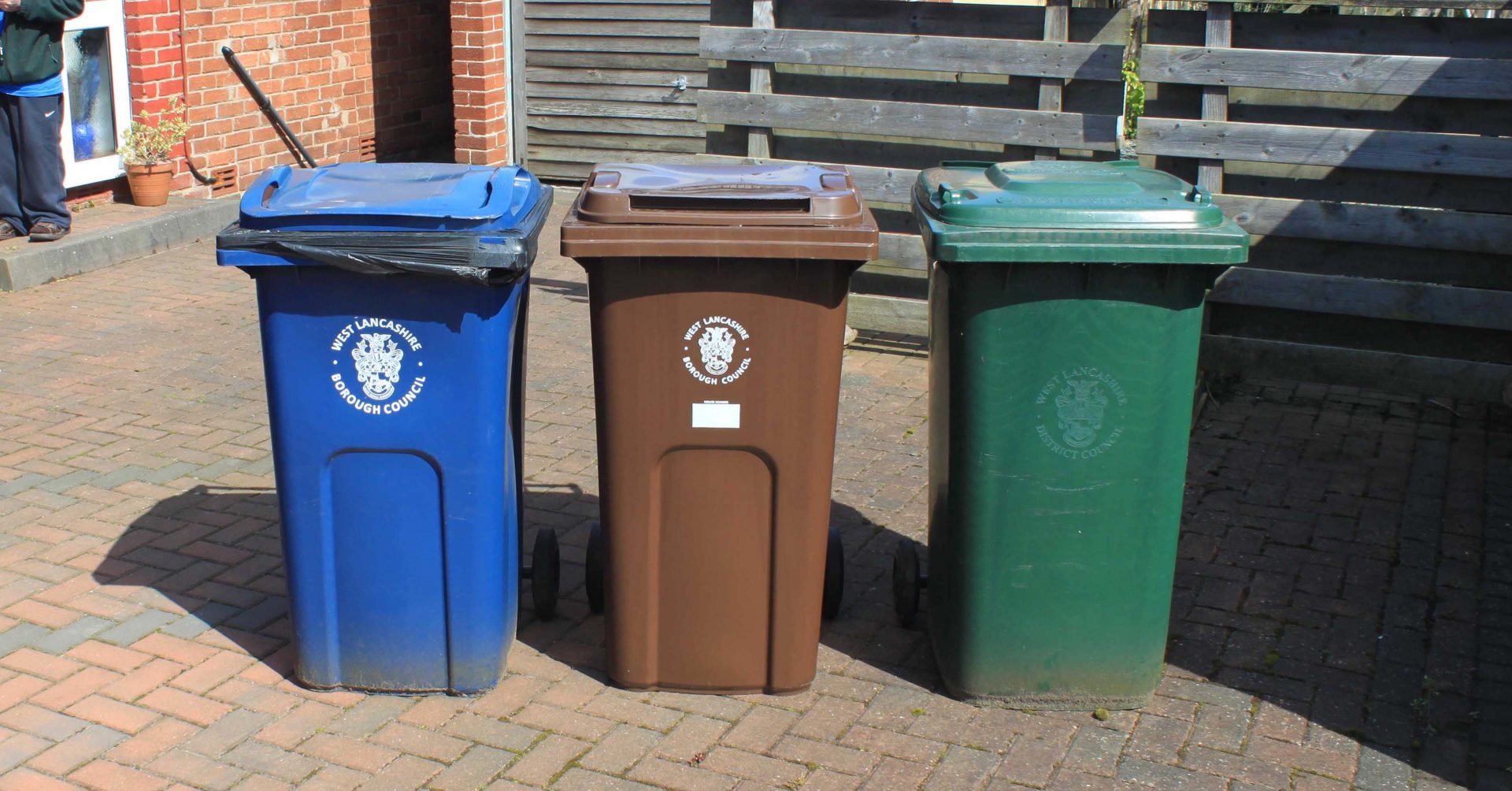 Three different coloured WLBC recycling bins