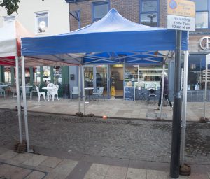A picture of a temporary garden gazebo serving as a stall at Ormskirk Market