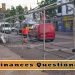 Ormskirk Market being disassembled by a worker in bright orange clothing